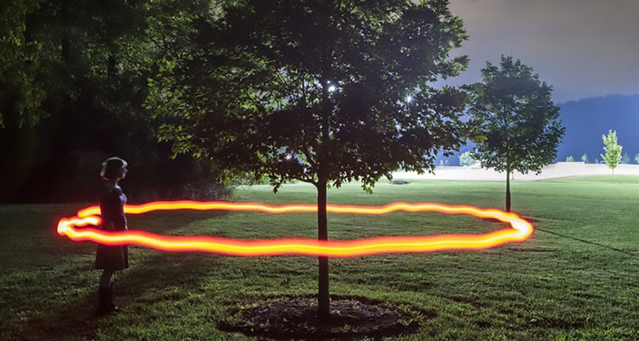 image of halo surrounding tree and person