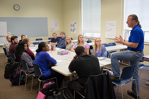 Clinical Mental Health Counseling master's students participate in a class discussion