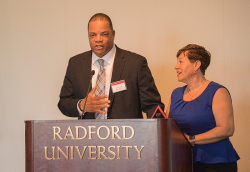 2017 Outstanding Service Award Winners David and Pebbles Smith, ’85 give their acceptance remarks after receiving their award at Friday’s Alumni Volunteer Leadership Business Lunch and Awards Ceremony in Kyle Hall.