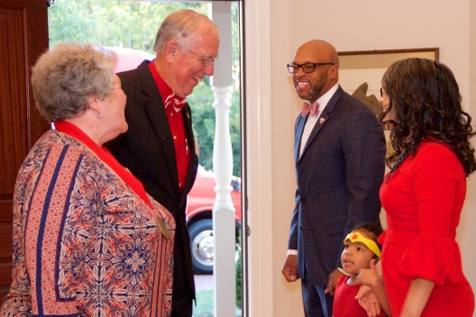 President Brian O. Hemphill, Ph.D., Radford University First Lady Dr. Marisela Rosas Hemphill and their daughter, Catalina, welcome alumnae from the Class of 1967 to the Governor Tyler House to celebrate their Golden Reunion.