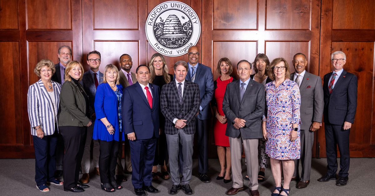 Members of the Radford University Board of Visitors and President Bret Danilowicz pose for an annual group photo during the full board meeting on Friday, Sept. 8.